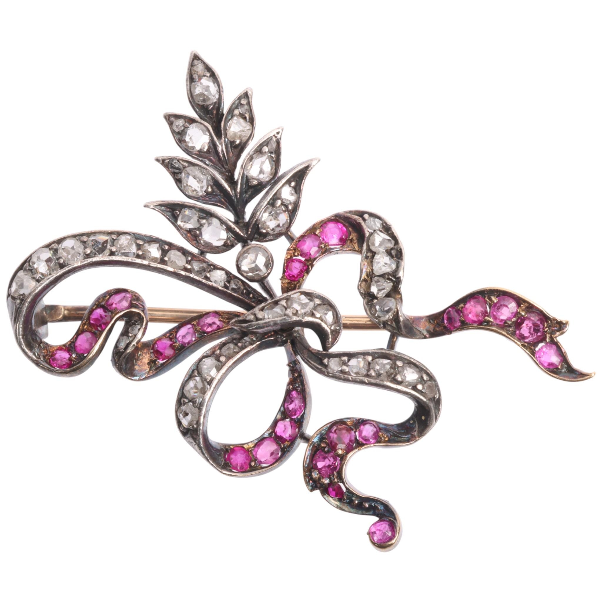 An Antique ruby and diamond brooch, circa 1850, of ribbon bow form, set ...