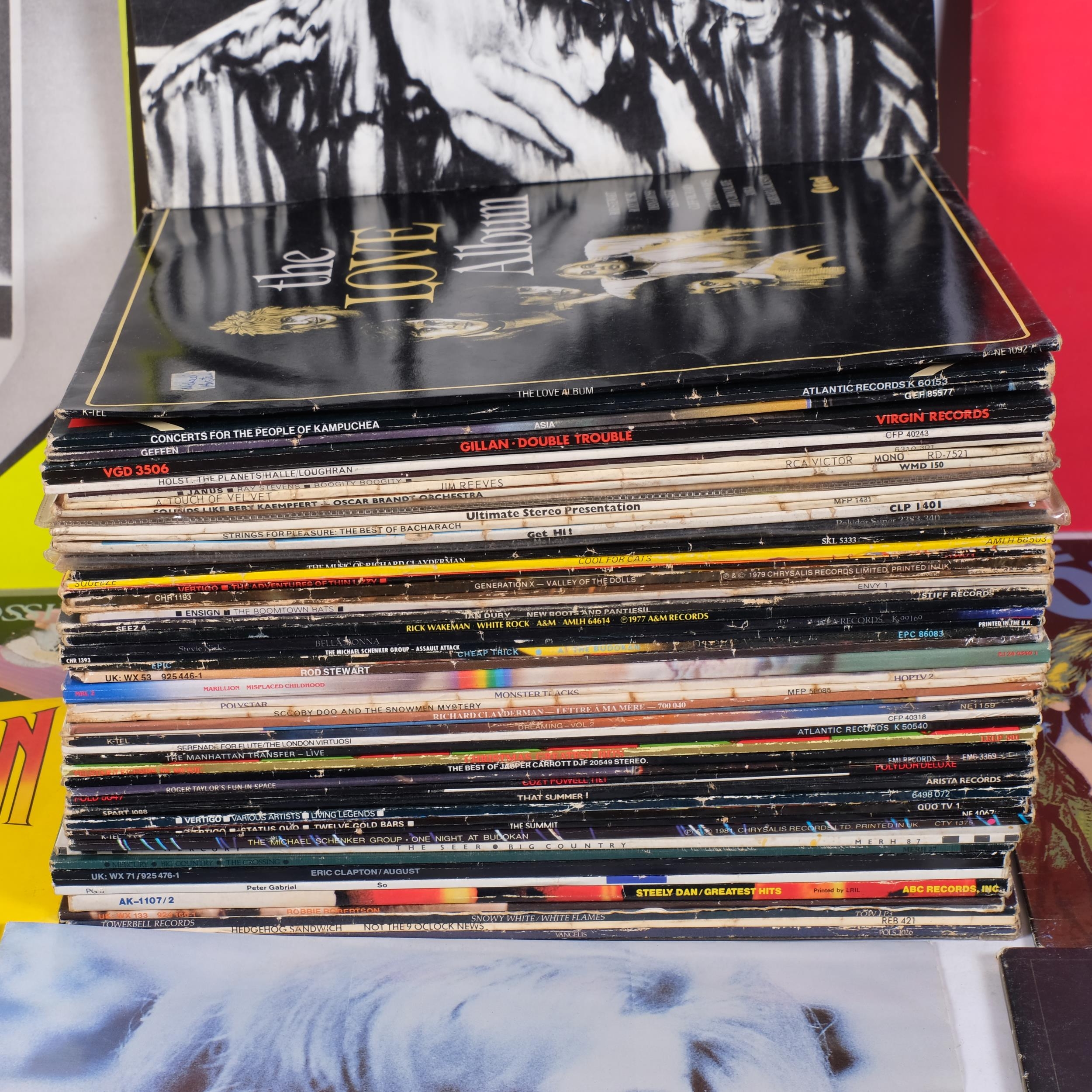 A quantity of vinyl records, examples including Kraftwerk Computer ...