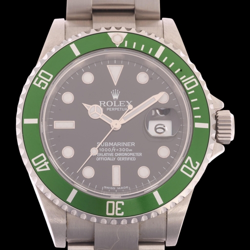 ROLEX - a stainless steel 'Kermit' Oyster Perpetual Date Submariner automatic calendar bracelet watch, ref. 16610LV, circa 2006, black dial with polished dot and baton hour markers having luminous inserts, polished Mercedes hands with luminous inserts, sweep centre seconds hand, cyclops date aperture, green bezel insert and Rolex stainless steel Oyster link bracelet, serial no. Z101194, case width 40mm, working order, boxed with papers