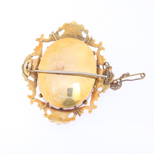 1122 - An Antique Victorian 9ct gold miniature portrait brooch, circa 1860, the oval panel with hand painte... 