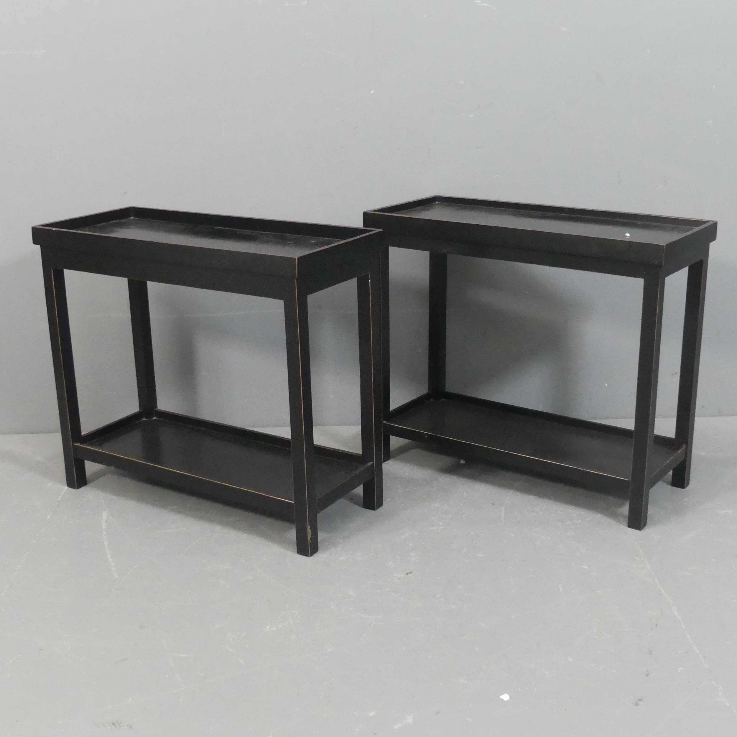 OKA - a pair of Jet two-tier side tables, with maker's labels. Width ...