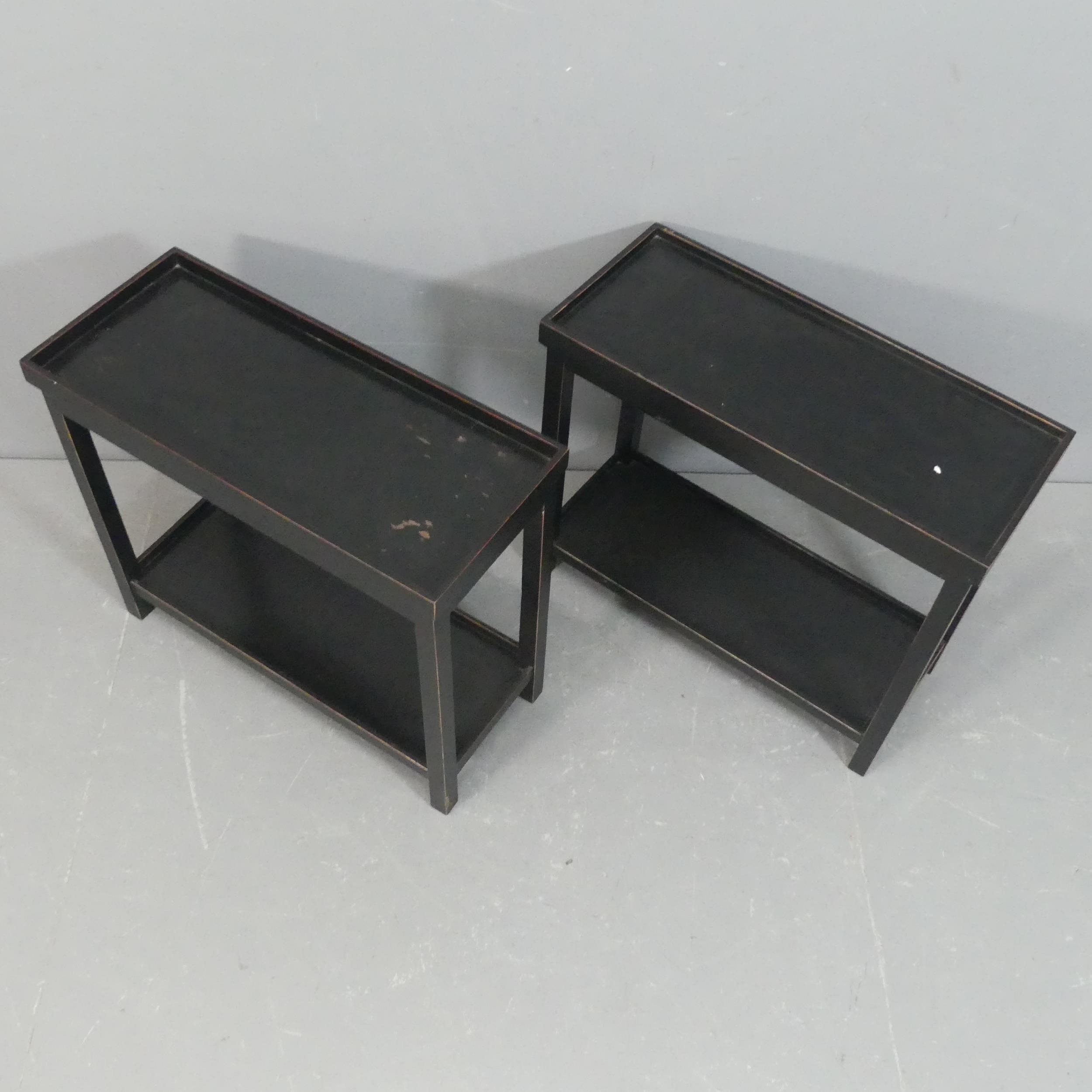 OKA - a pair of Jet two-tier side tables, with maker's labels. Width ...