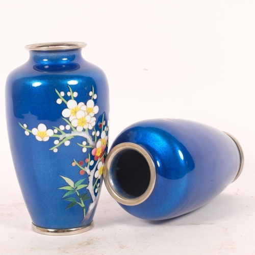 83 - A pair of fine quality blue ground cloisonne vases, with enamelled floral decoration, H15cm