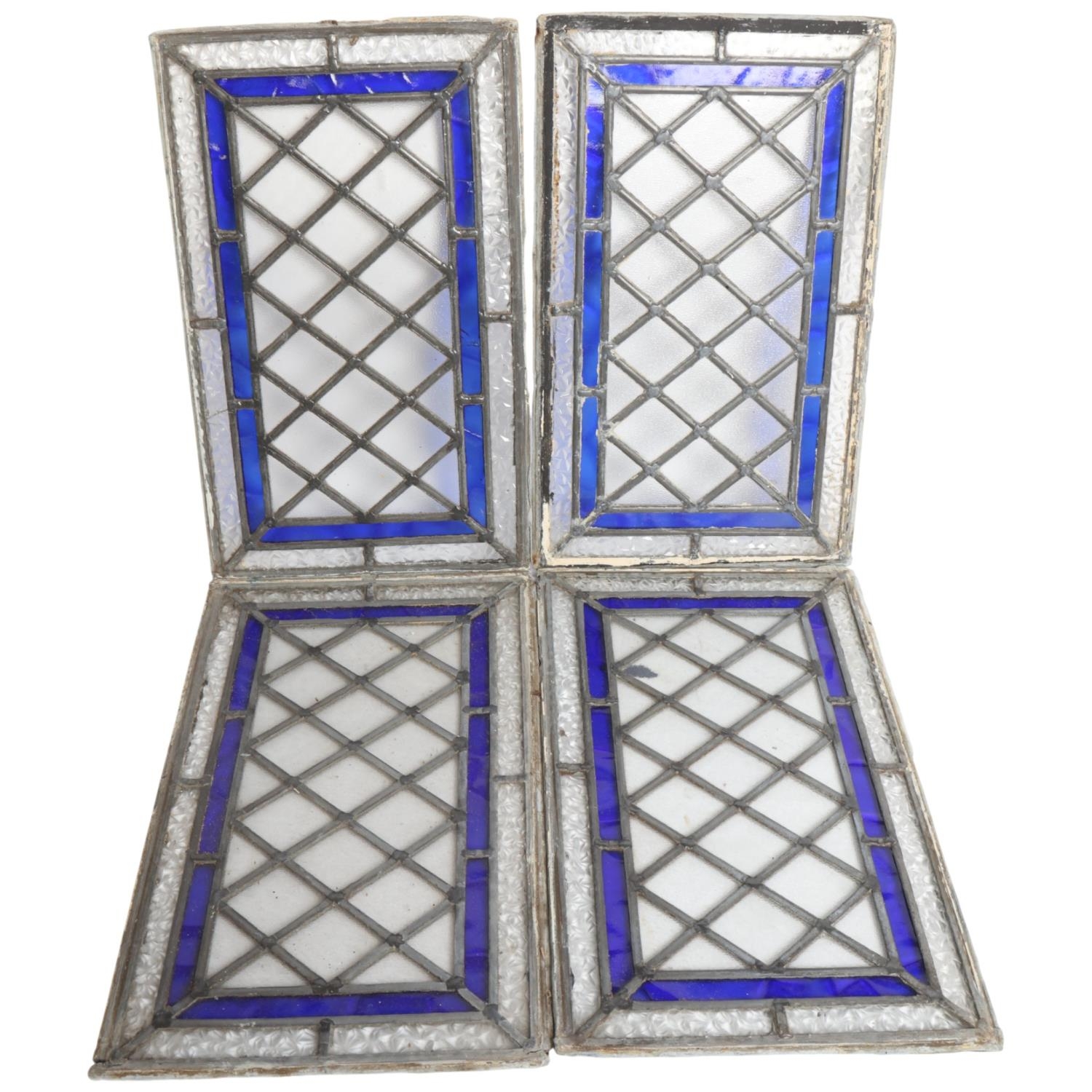 A set of 4 diamond pattern leadlight glazed panels, with blue border ...