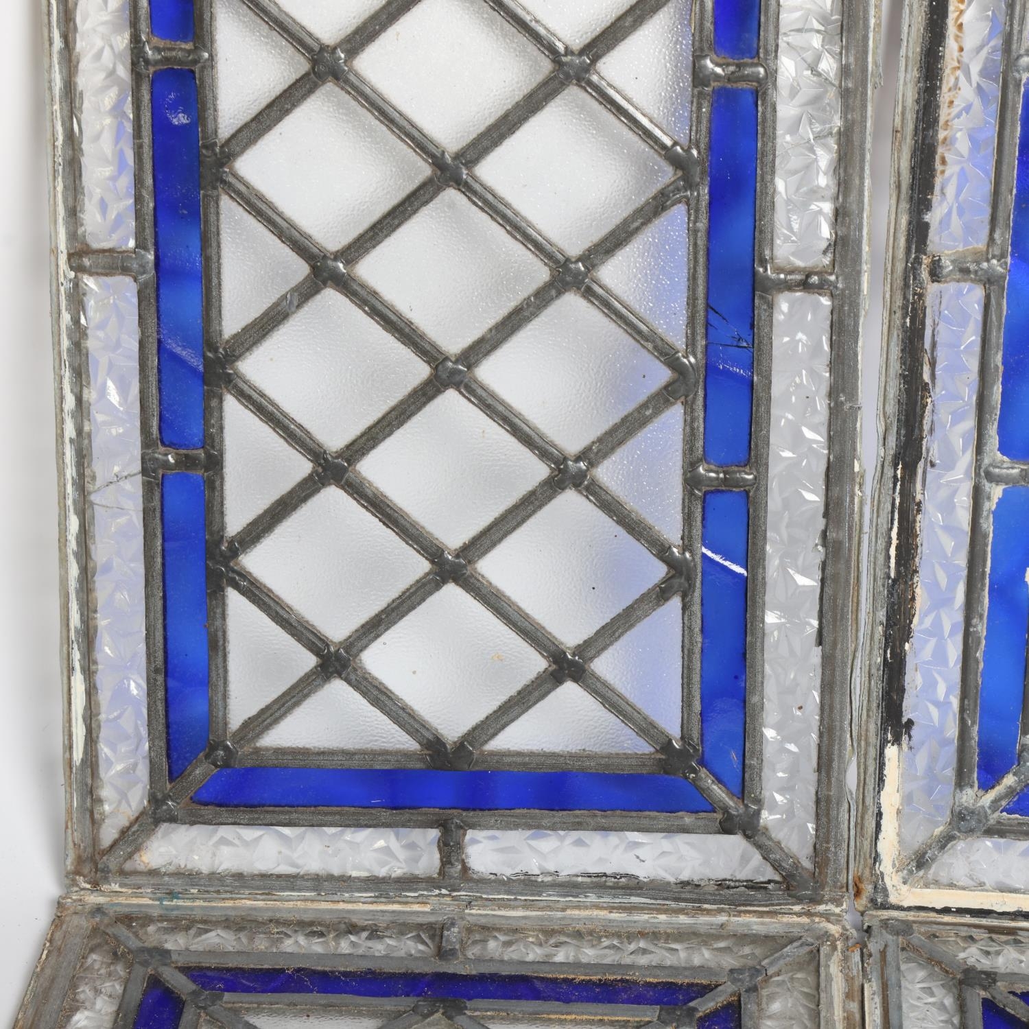 A set of 4 diamond pattern leadlight glazed panels, with blue border ...