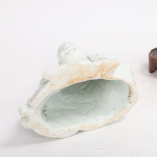 365 - A Chinese blanc de chine porcelain figure of Budai, on original fitted wood stand, height 14.5cm