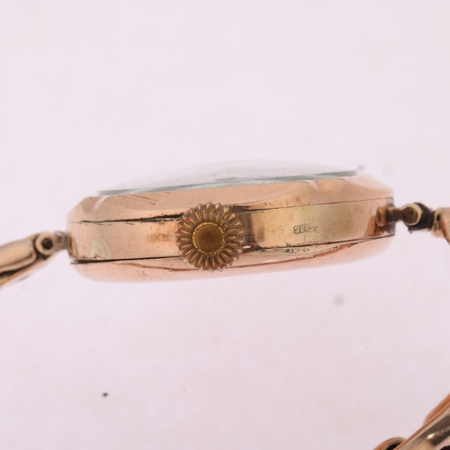 1024 - A 9ct gold mechanical bracelet watch, circa 1920, white enamel dial with black and red Arabic numera... 
