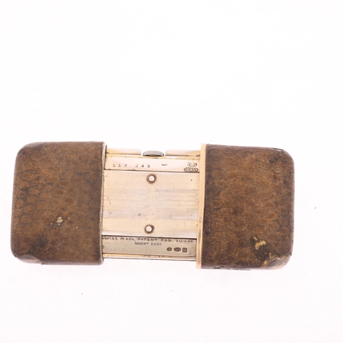1039 - An Art Deco Swiss sterling silver leather mechanical purse watch, circa 1930, champagne dial with Ar... 