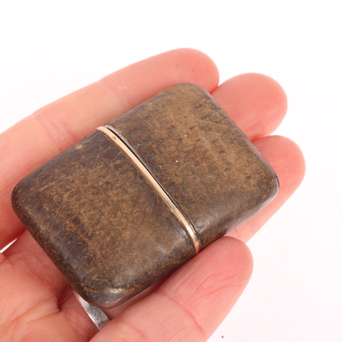 1039 - An Art Deco Swiss sterling silver leather mechanical purse watch, circa 1930, champagne dial with Ar... 