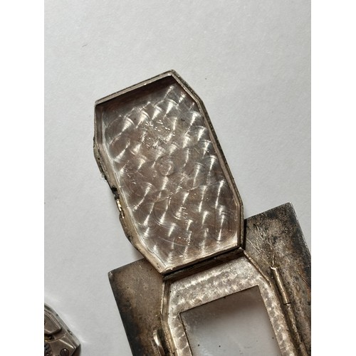 1030 - DUNHILL - an Art Deco silver and black enamel combination pocket lighter and watch, circa 1930, roun... 