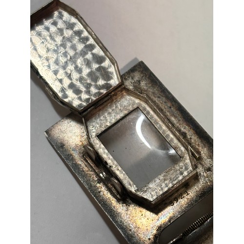 1030 - DUNHILL - an Art Deco silver and black enamel combination pocket lighter and watch, circa 1930, roun... 