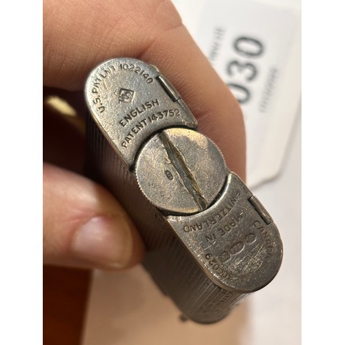 1030 - DUNHILL - an Art Deco silver and black enamel combination pocket lighter and watch, circa 1930, roun... 