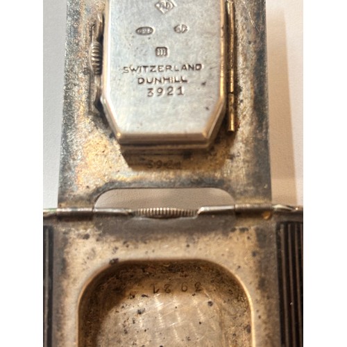 1030 - DUNHILL - an Art Deco silver and black enamel combination pocket lighter and watch, circa 1930, roun... 