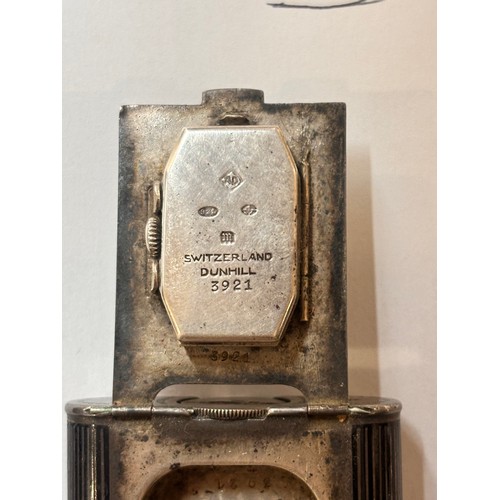 1030 - DUNHILL - an Art Deco silver and black enamel combination pocket lighter and watch, circa 1930, roun... 