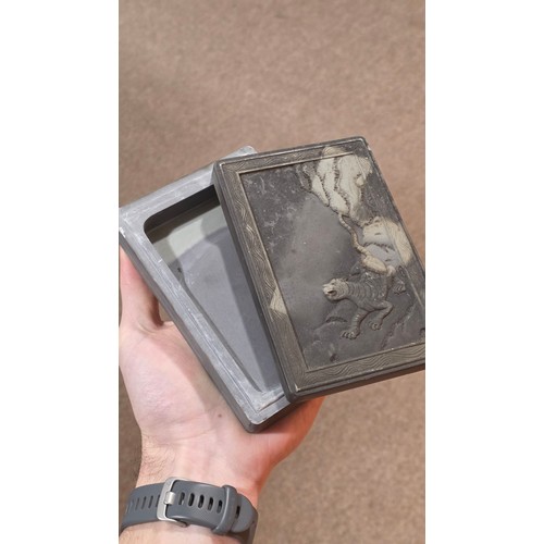 364 - A Chinese inkstone box and cover, with tiger design relief carved lid, 15cm x 10cm, and a carved soa... 