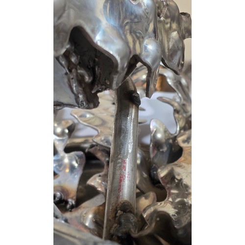 136 - LEIGH DYER (born 1959) - a spectacular handmade stainless steel wall mount, designed to hold a diver... 