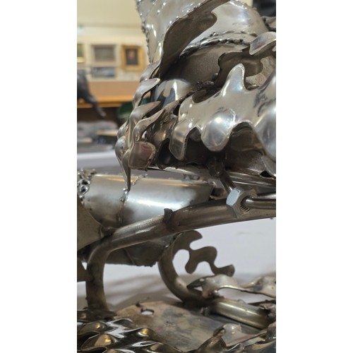 136 - LEIGH DYER (born 1959) - a spectacular handmade stainless steel wall mount, designed to hold a diver... 