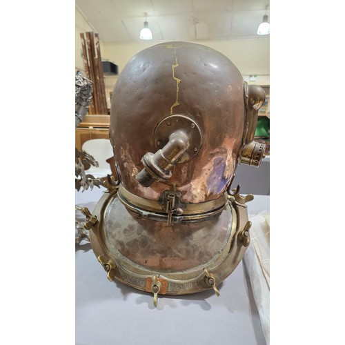 136 - LEIGH DYER (born 1959) - a spectacular handmade stainless steel wall mount, designed to hold a diver... 