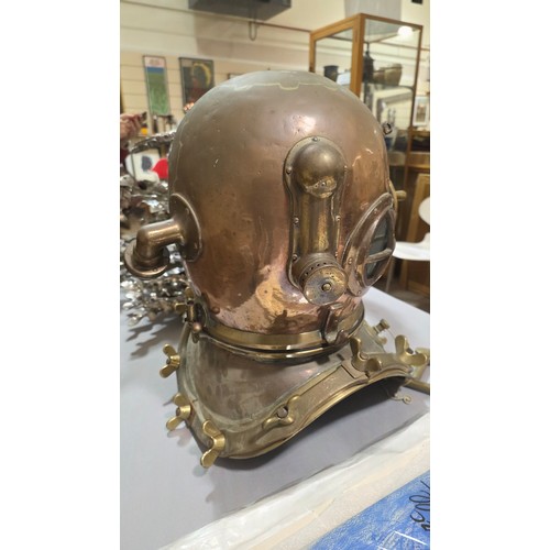 136 - LEIGH DYER (born 1959) - a spectacular handmade stainless steel wall mount, designed to hold a diver... 