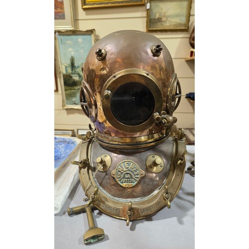 136 - LEIGH DYER (born 1959) - a spectacular handmade stainless steel wall mount, designed to hold a diver... 