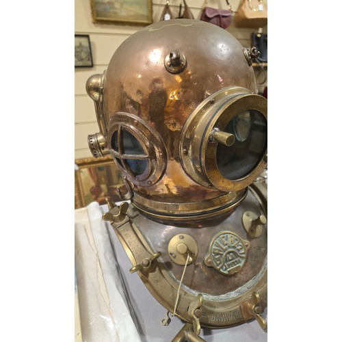 136 - LEIGH DYER (born 1959) - a spectacular handmade stainless steel wall mount, designed to hold a diver... 