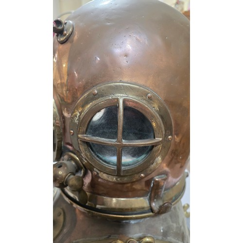 136 - LEIGH DYER (born 1959) - a spectacular handmade stainless steel wall mount, designed to hold a diver... 