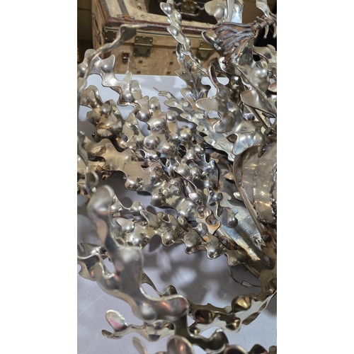 136 - LEIGH DYER (born 1959) - a spectacular handmade stainless steel wall mount, designed to hold a diver... 