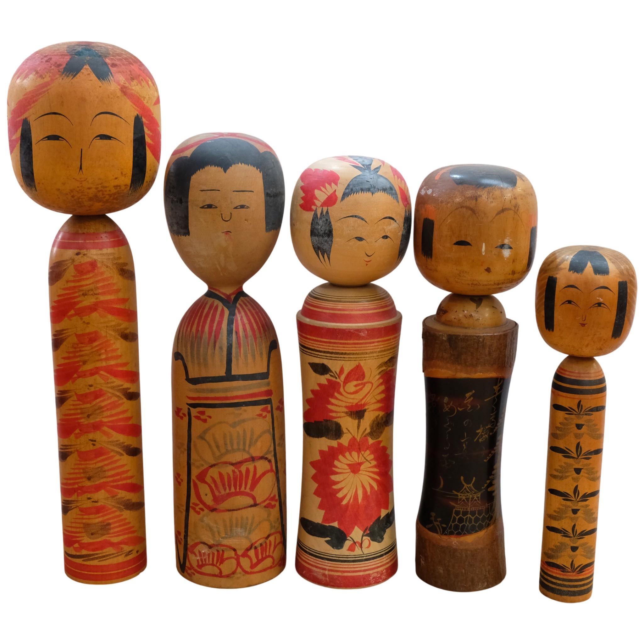 A collection of 5 Vintage Kokeshi dolls, including a large hand painted ...