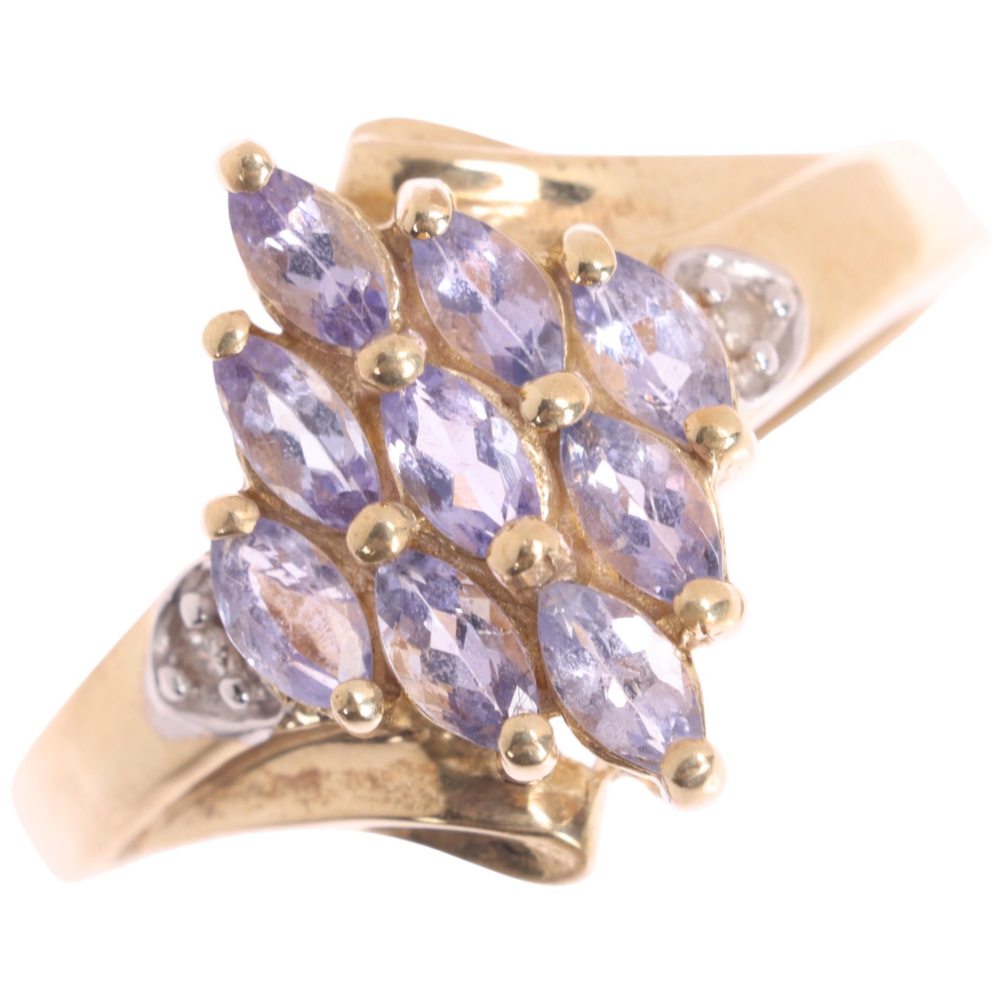 A 9ct gold tanzanite and diamond cluster ring, QVC, set with marquise ...