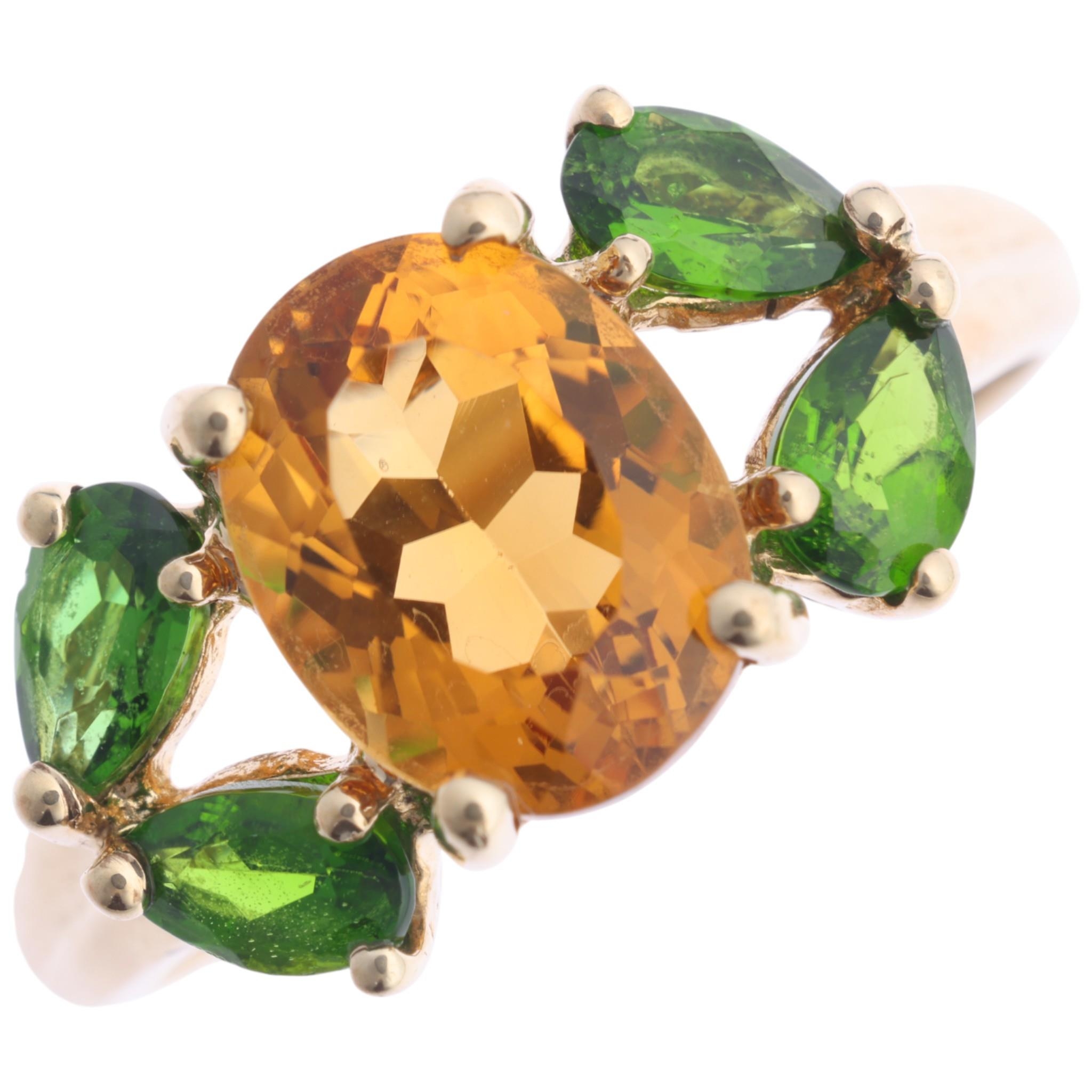 A 9ct gold citrine and peridot ring, QVC, setting height 9.4mm, size O ...