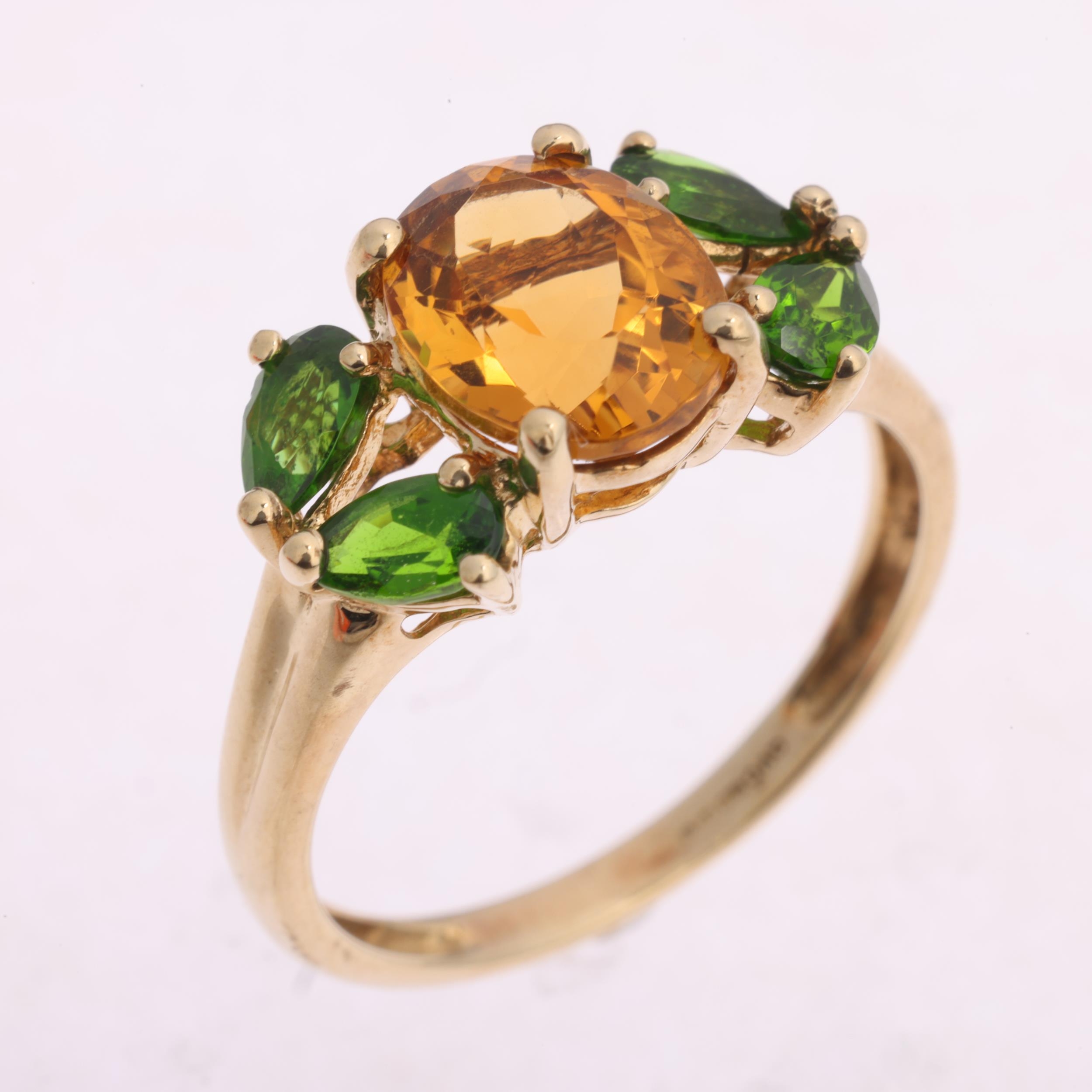 A 9ct gold citrine and peridot ring, QVC, setting height 9.4mm, size O ...