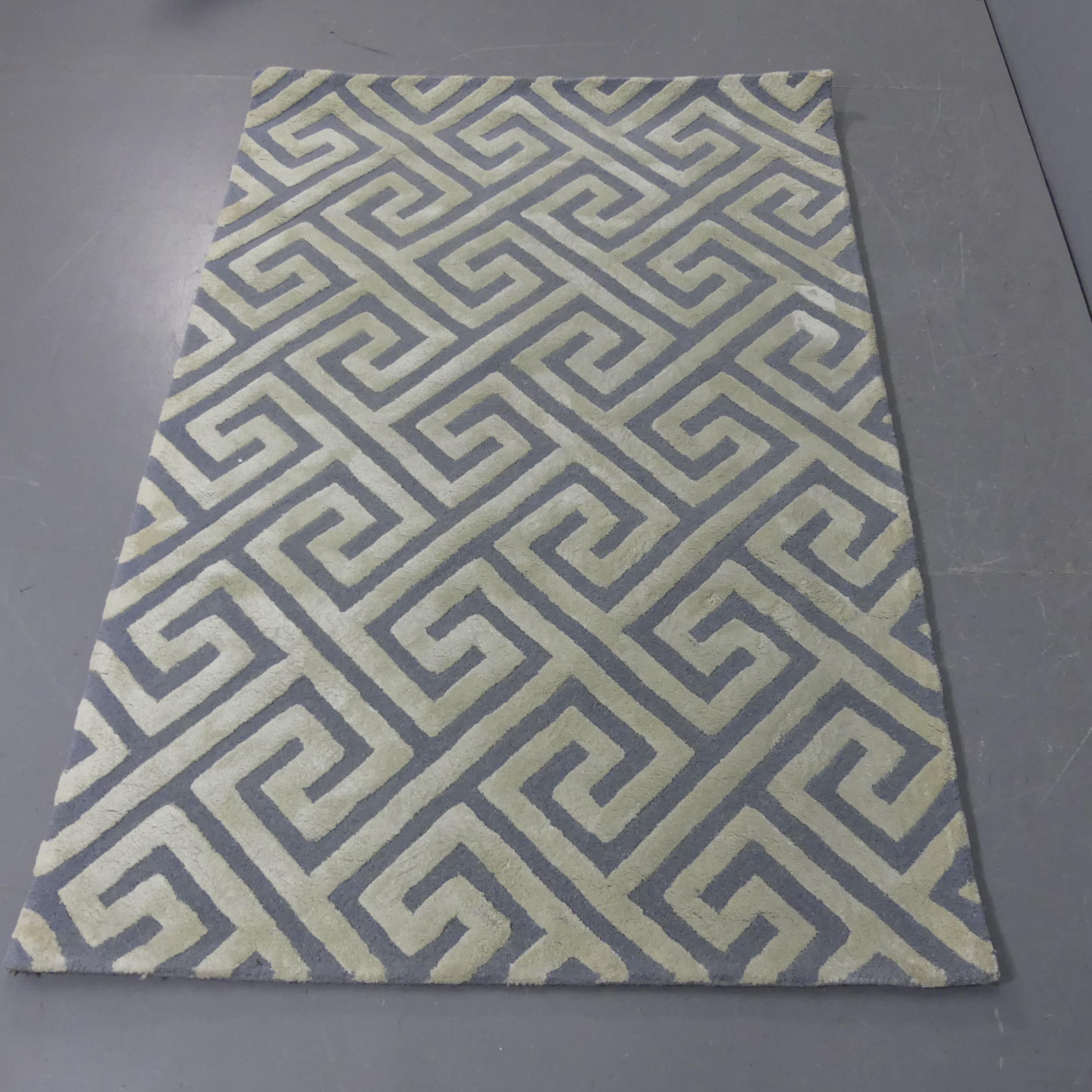 A contemporary handmade rug, Roman Scales pattern, in duck egg ...