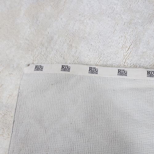 A large hand made modern white wool thick pile rug, The Rug Company UK ...