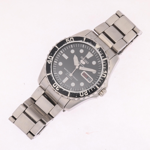 1028 - SEIKO 5 - a stainless steel Sports automatic calendar bracelet watch, ref. 7S36-03C0, black dial wit... 