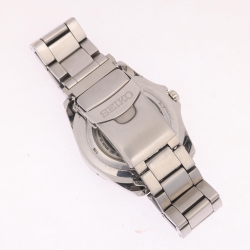 1028 - SEIKO 5 - a stainless steel Sports automatic calendar bracelet watch, ref. 7S36-03C0, black dial wit... 