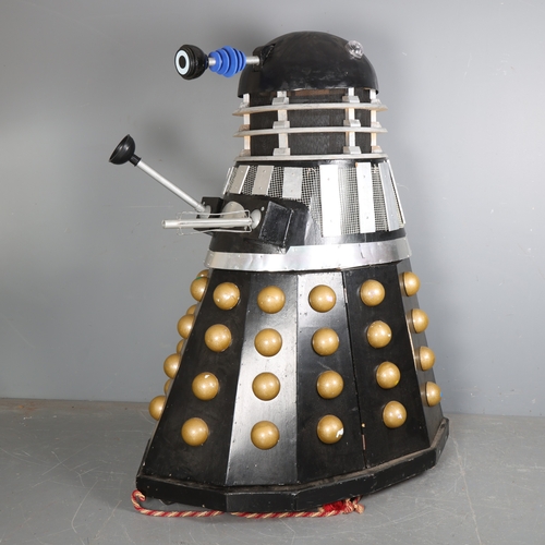 A full-scale scratch-built model Dalek, painted wood and metal, overall ...