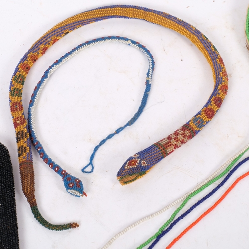 267 - A selection of Vintage African beaded ware, including a necklace, snakes, purse, etc