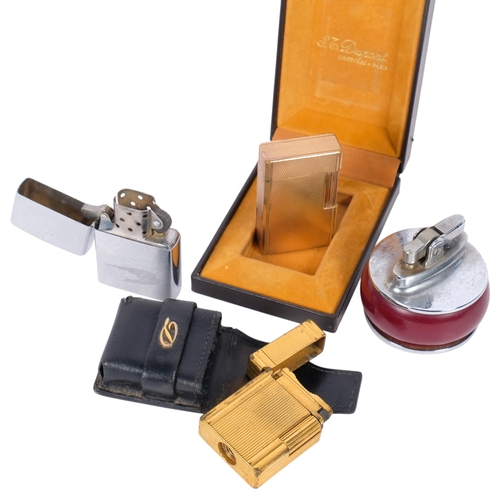 281 - 2 gold plated Dupont lighters, each in fitted case, serial numbered to the underside, Rolstar Bakeli... 