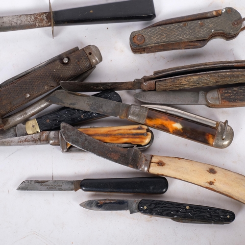 283 - A fine collection of Antique and later folding penknives, including horn-handled examples, makers in... 