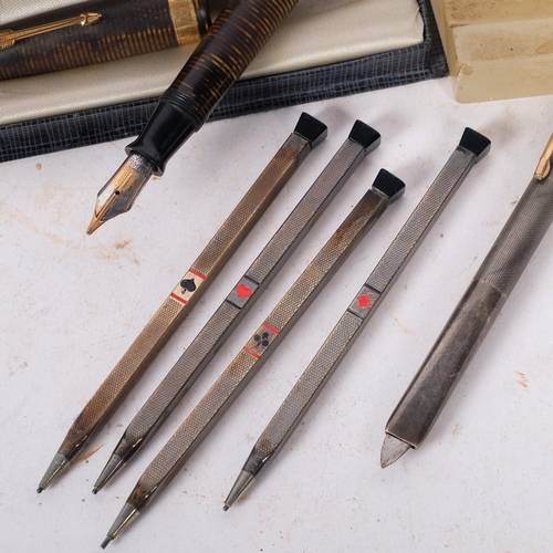 285 - A Parker 14ct nibbed Vacuumatic fountain pen, a silver-cased letter opening retractable knife, and a... 