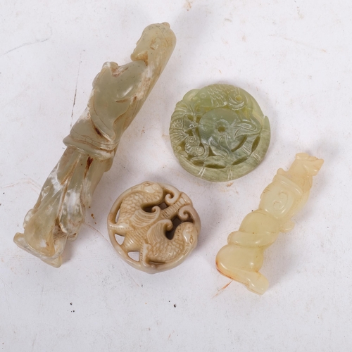 293 - A carved white jade pendant featuring a pair of entwined phoenixes, a jadeite circular pendant, a ca... 