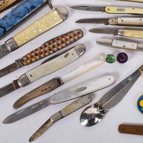 294 - A collection of Antique and later folding penknives, including some silver-bladed examples with moth... 