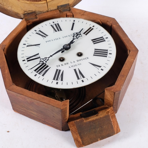 An Antique French oak-cased station clock, the later dial with ...