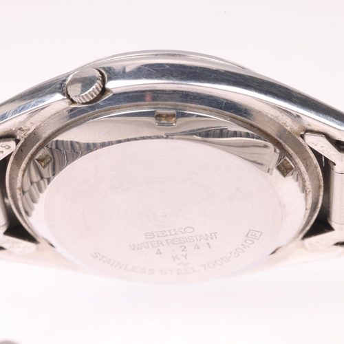 1027 - SEIKO 5 - a stainless steel automatic calendar bracelet watch, ref. 7009-3040, blue dial with baton ... 