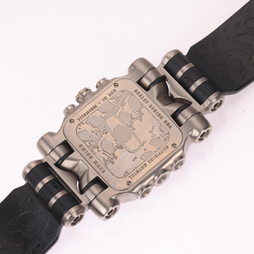 1029 - OAKLEY - a titanium Minute Machine quartz chronograph calendar wristwatch, ref. 10-191, black dial w... 