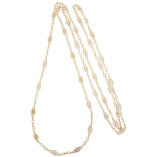 1119 - An Antique French 18ct gold fancy link long guard chain necklace, maker FL, with balance scales, sha... 