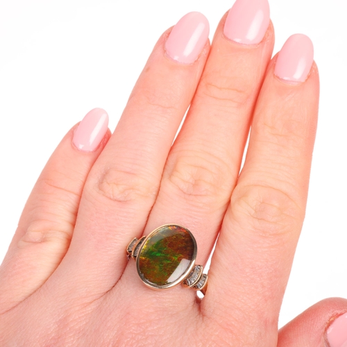 A 9ct gold ammolite and diamond ring, TJC, setting height 16.7mm, size ...