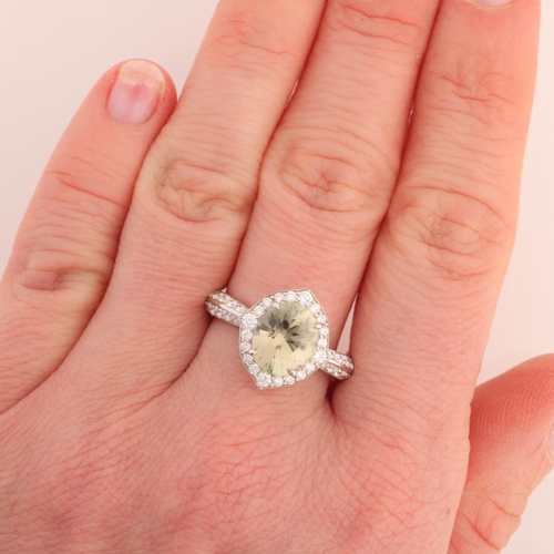 100 - KAT FLORENCE - an 18ct white gold zultanite and D colour flawless diamond cluster ring, set with a 2... 