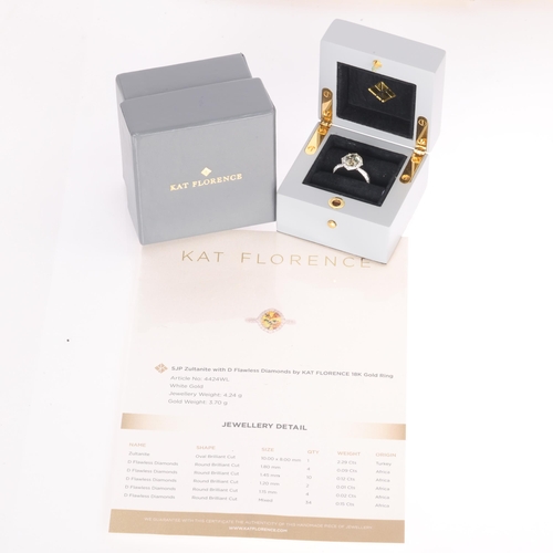100 - KAT FLORENCE - an 18ct white gold zultanite and D colour flawless diamond cluster ring, set with a 2... 