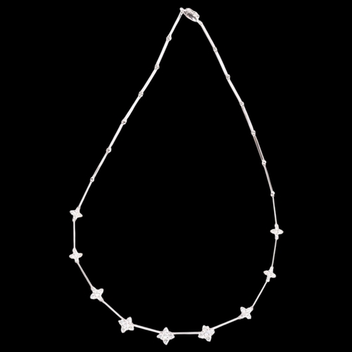 135 - An 18ct white gold diamond collar necklace, maker RG, the cruciform motifs claw set with graduated m... 